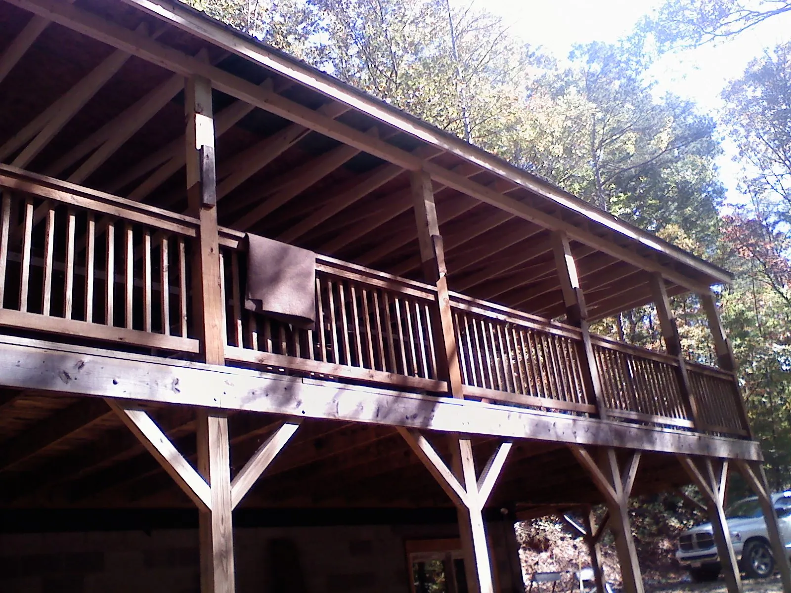 Timber framing under a new elevated porch and deck — Roof Leak Repair in Westbrook by Roofing Brothers
